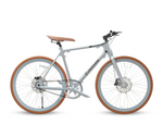 White VANPOWER City Vanture Ebike with tan tires and a leather saddle