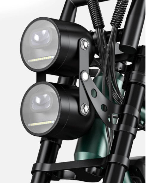 Close-up of the Engwe M20's dual LED headlights, ensuring visibility and safety during night rides.