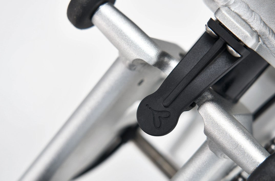 Close-up of the Iruka C Ebike's folding mechanism, emphasizing convenience.