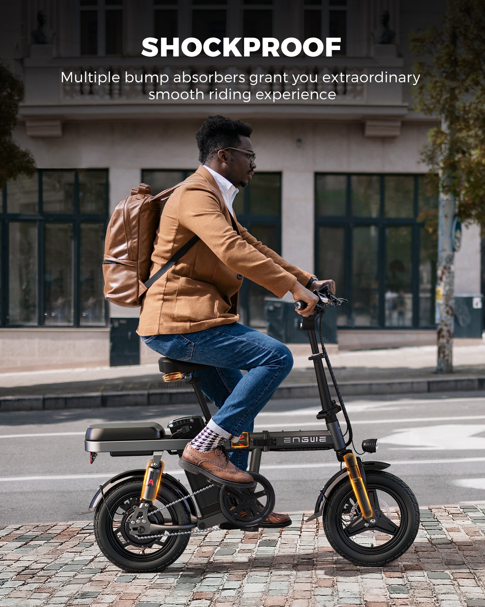 Man riding a black and orange Engwe T14 ebike in an urban setting, illustrating the bike's shockproof features for a smooth ride.