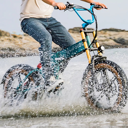 How to Ride Your E-Bike in the British Weather: Rain, Wind, Cold & Dark (2026 Guide)