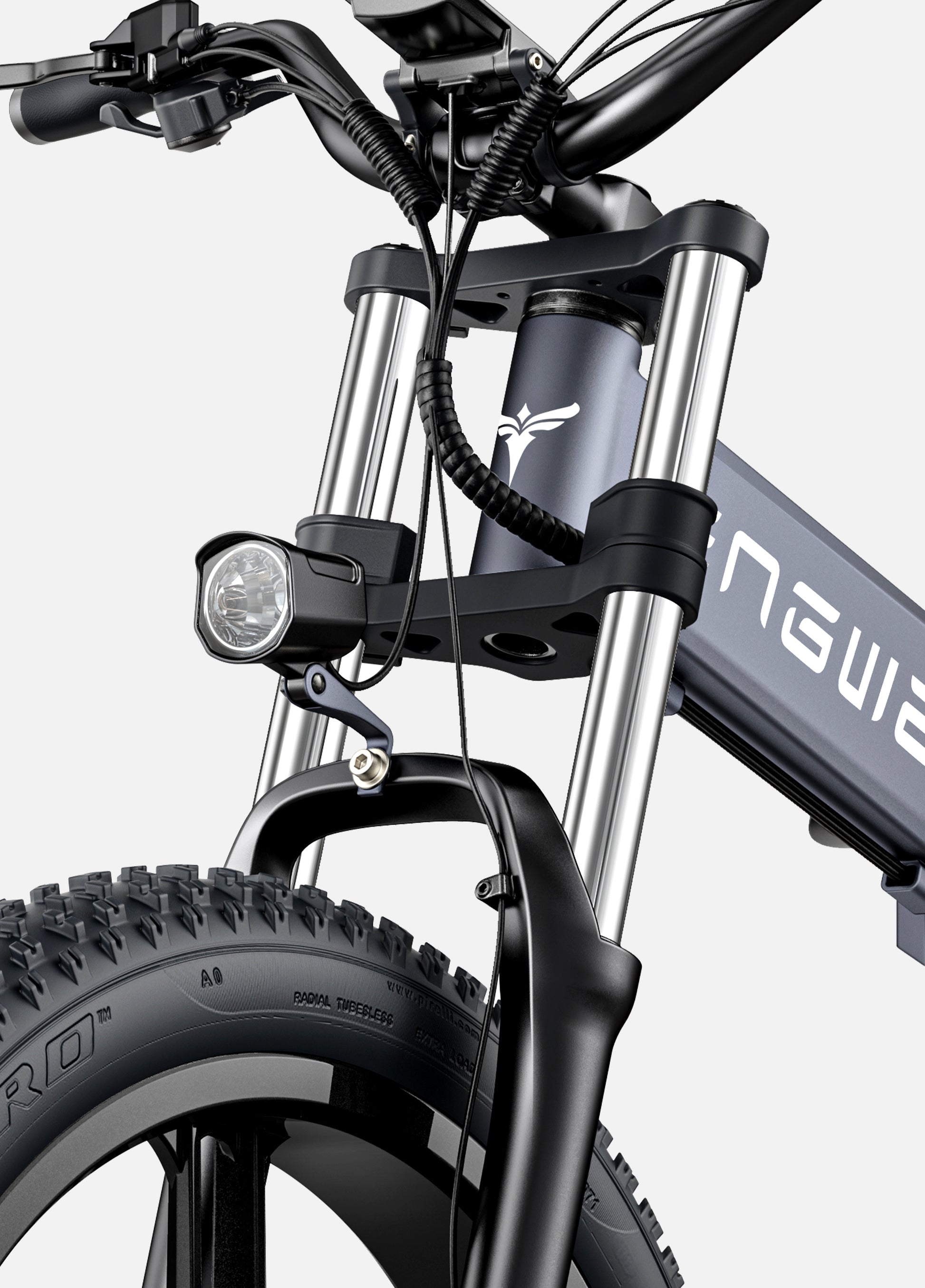 Close-up of Engwe X26's front suspension with hydraulic shock absorbers for enhanced stability on rough terrains.