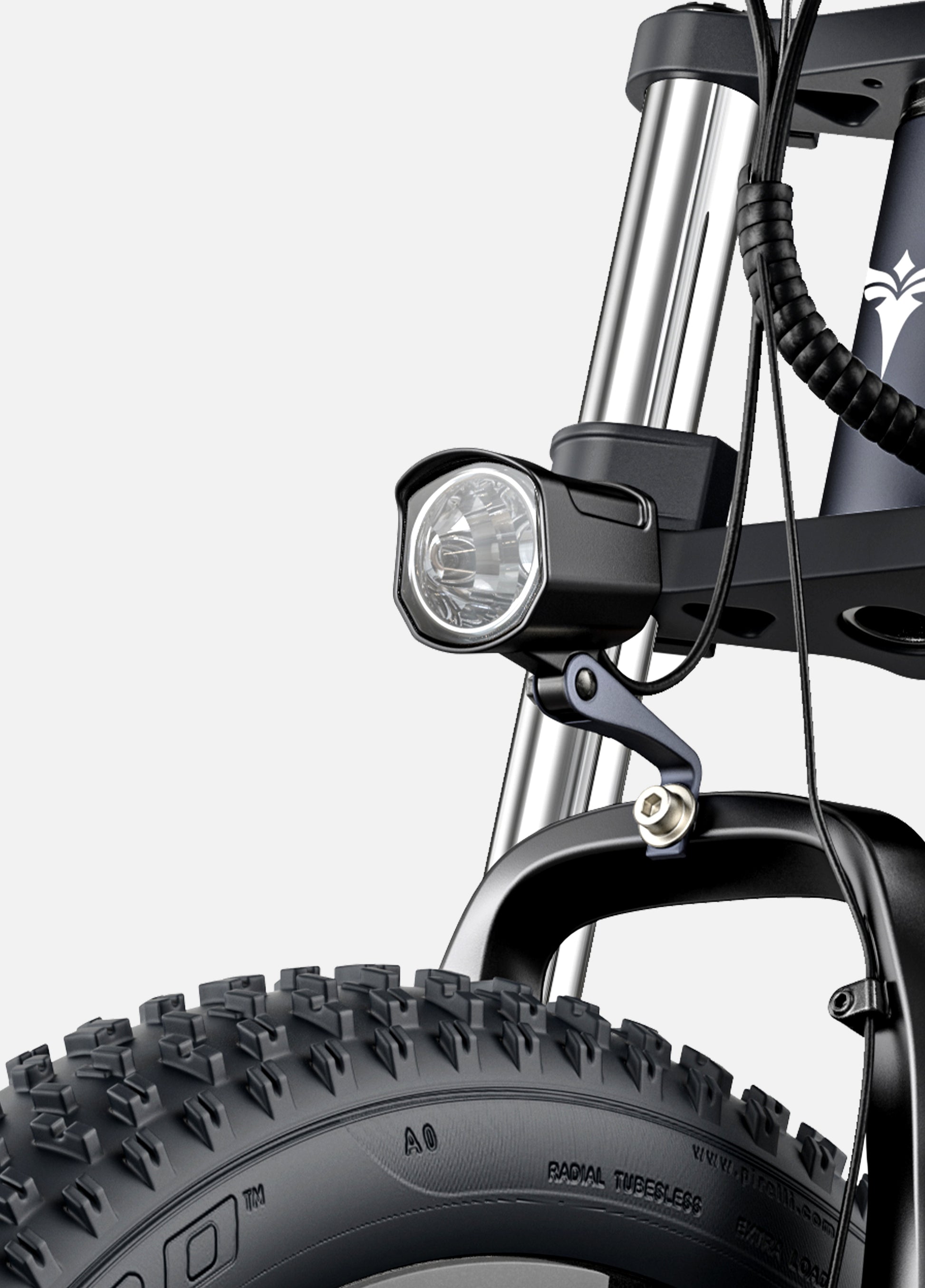 Zoomed-in view of Engwe X26 ebike's front LED headlight for increased visibility during night rides.