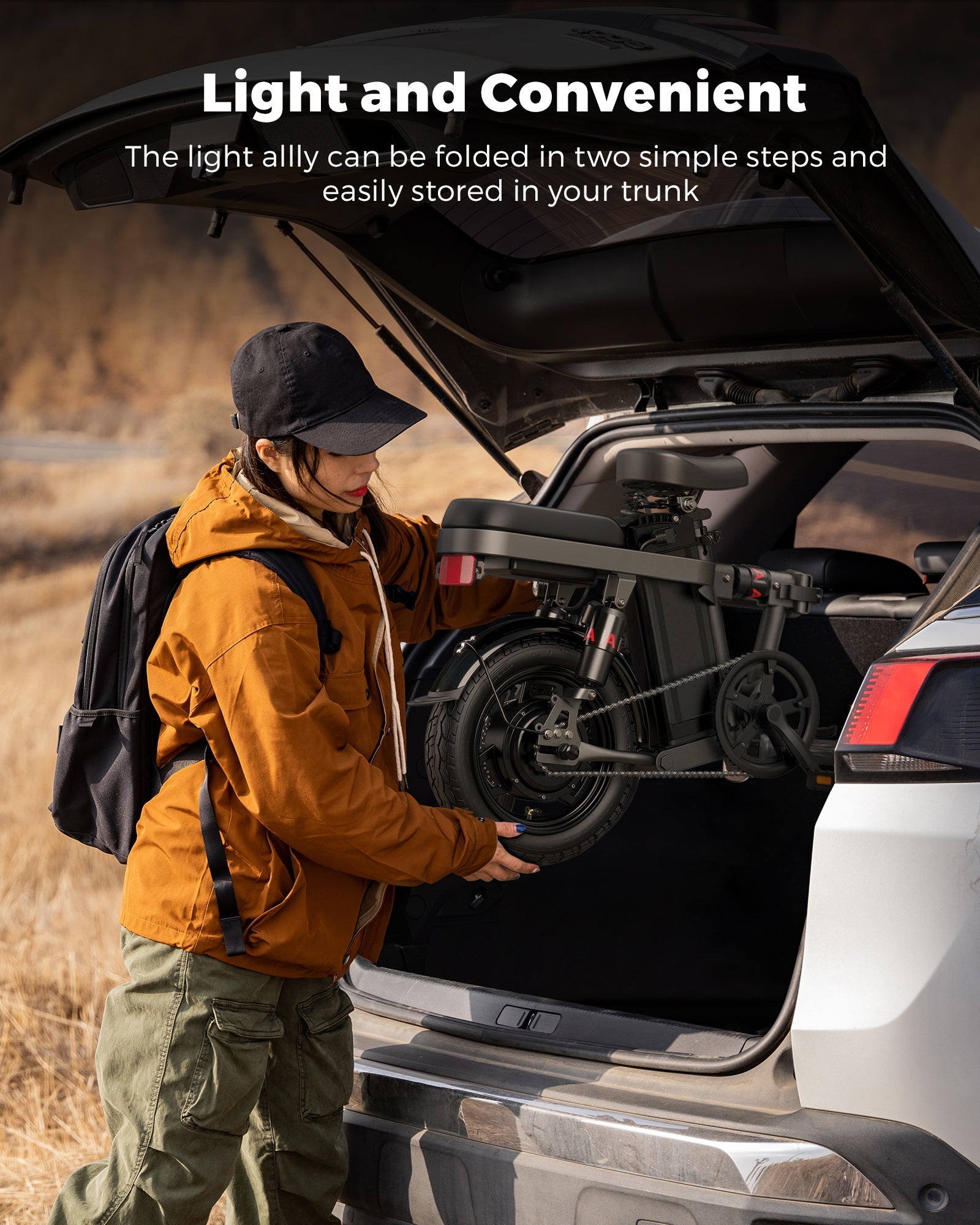 Active person folding Engwe T14 Ebike into car trunk, highlighting its compact design and portability.