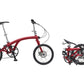Elegant red Iruka S Ebike, complete setup with pedals and adjustable seat visible.