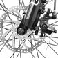 Detailed view of Eskute Polluno eBike's disc brake and front wheel assembly.