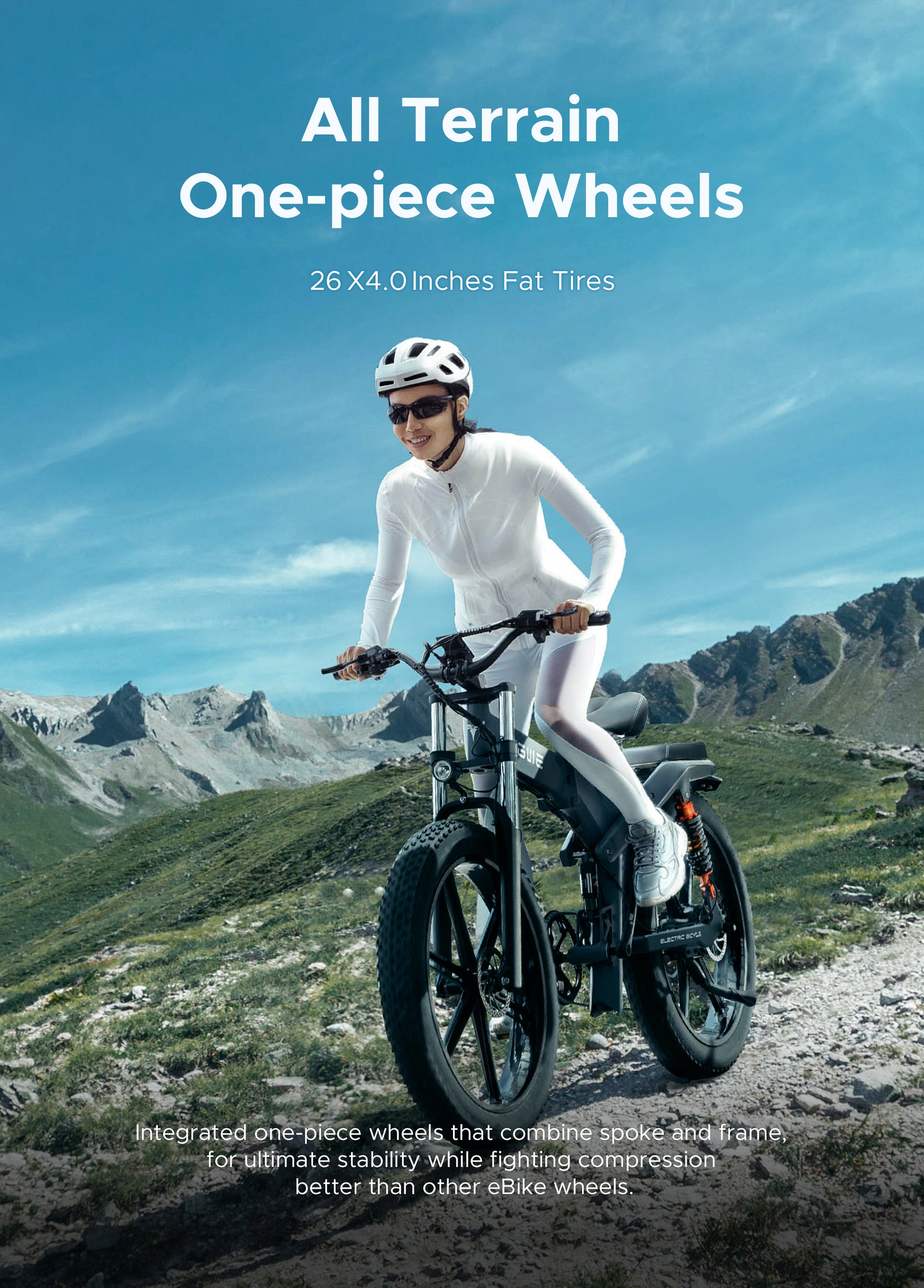 Female cyclist riding the Engwe X26 ebike with one-piece wheels on mountain terrain, exemplifying all-terrain capability.