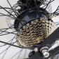 Macro shot of the Eole S electric bike's gear cassette and rear wheel, emphasizing the quality of components.
