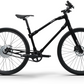 Sleek black Essential Boost bike displayed on a white background, highlighting its streamlined design.