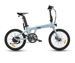 The teal blue Air 20 Folding electric bicycle with black features, side angle. 
